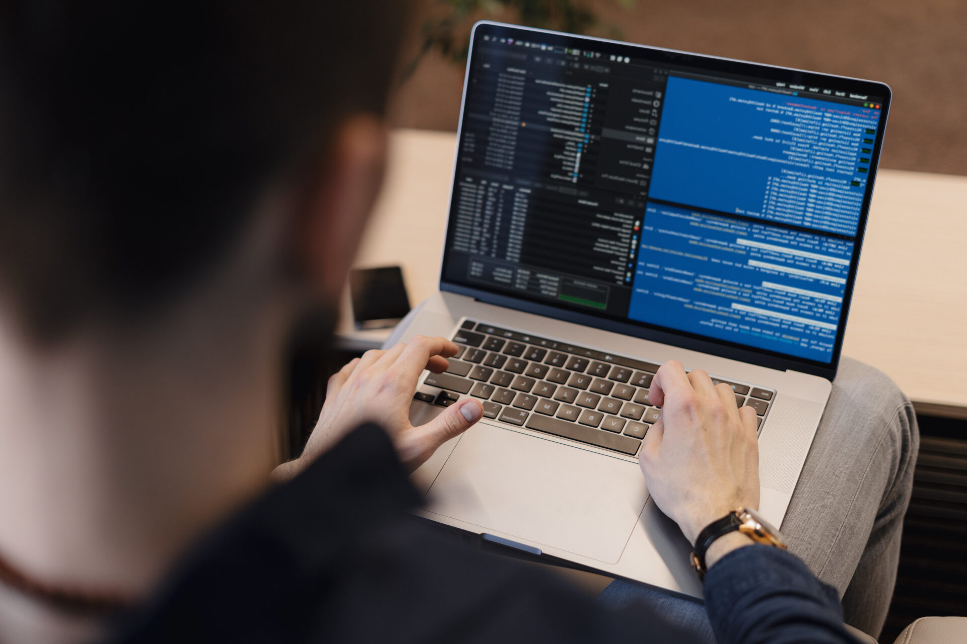 Man working on computer. Young it worker using laptop in the office, Internet marketing, technology, finance, business concept