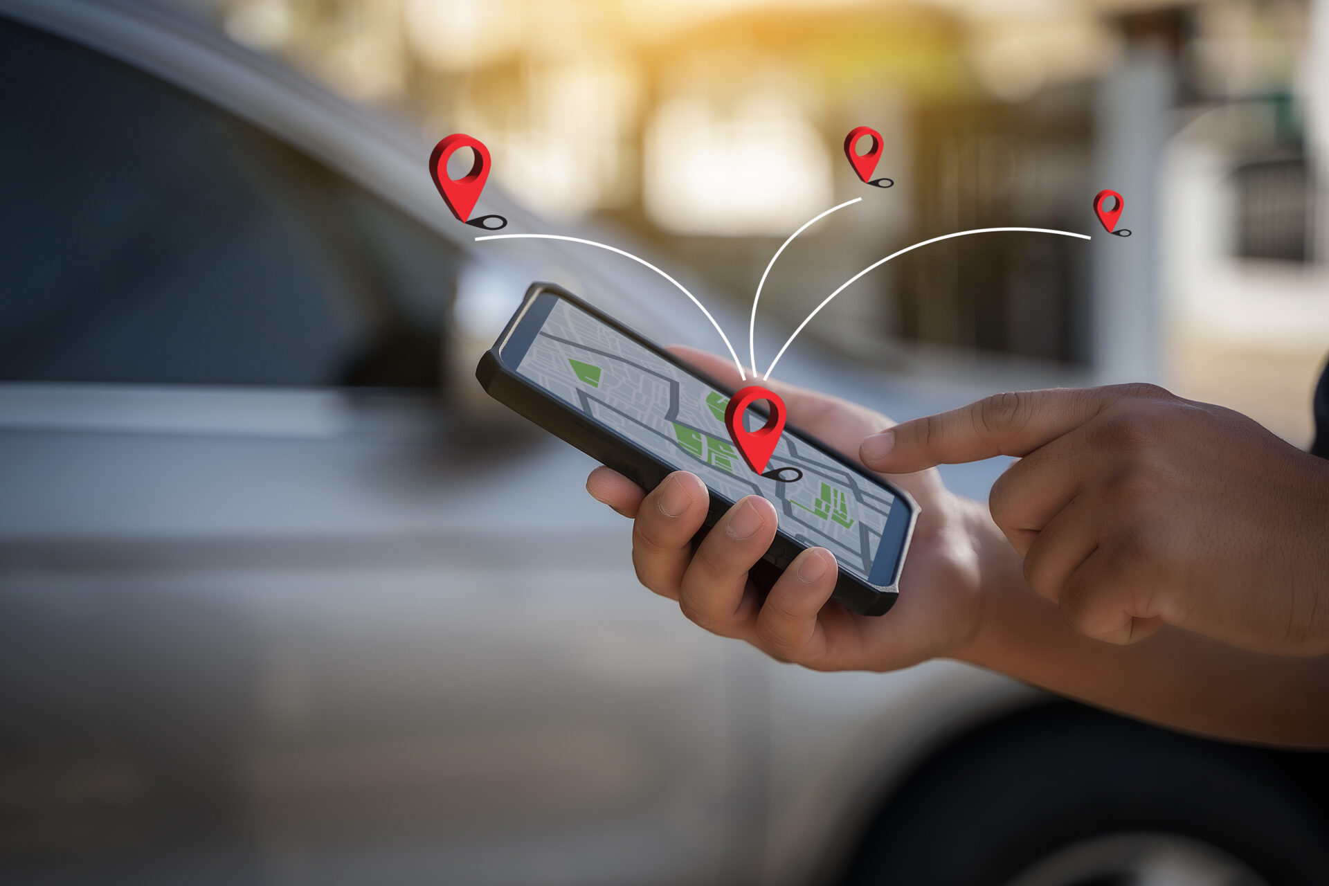 A man makes use of GPS and the internet. online map in the car controls the navigator for GPS tracking.
