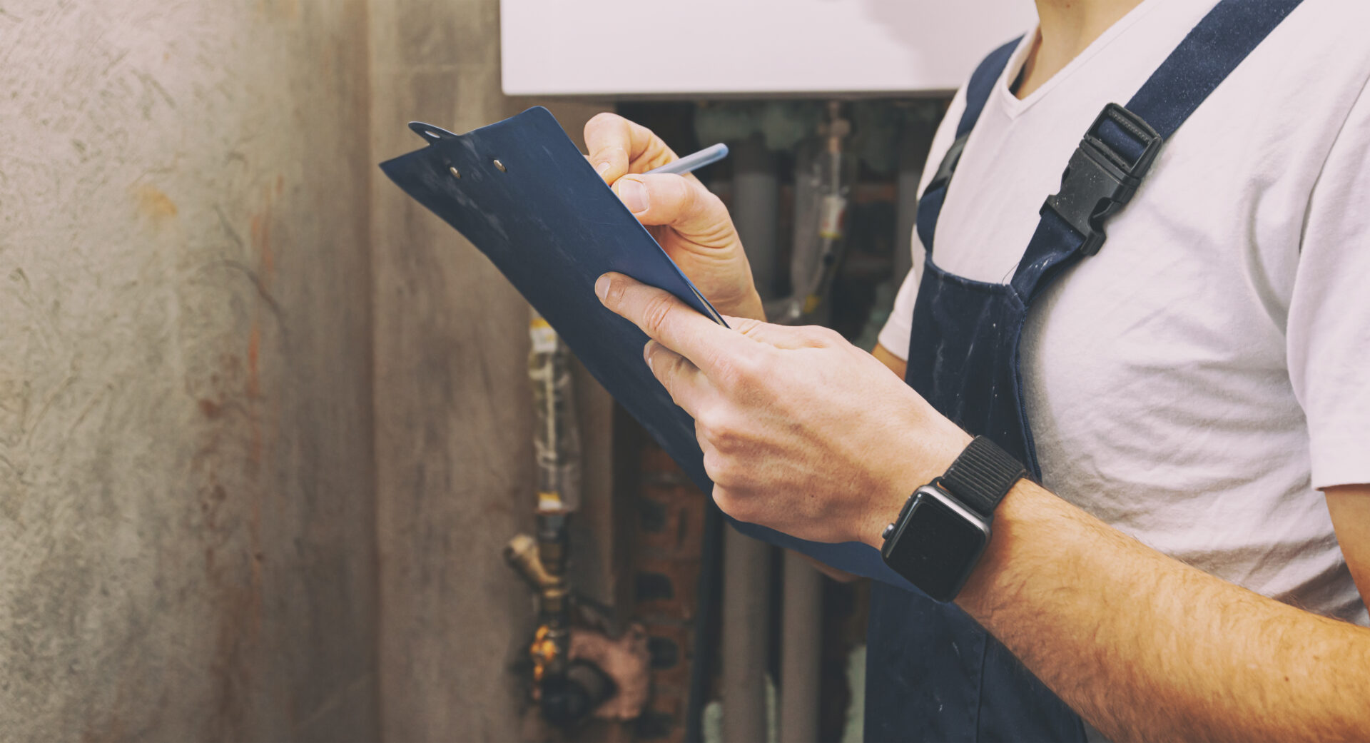 The plumber calculates the amount for the work performed